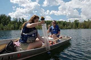 WSI interns Jessica Rhodes and Chelsea Cooper test water quality on a local lake
