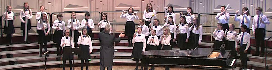 The NMC Children's Choir performs with program director Jeffrey Cobb