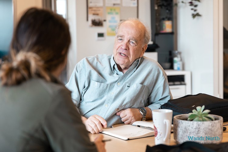 Photo of two people talking