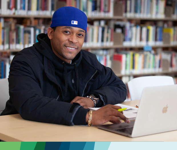 Male student with laptop