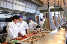 NMC Great Lakes Culinary Institute program photo of students working at Lobdell's Teaching Restaurant