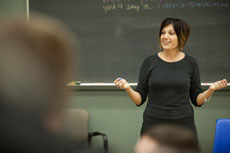 NMC photo of an instructor in front of a classroom