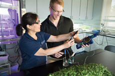 NMC photo of a freshwater studies program instructor and student