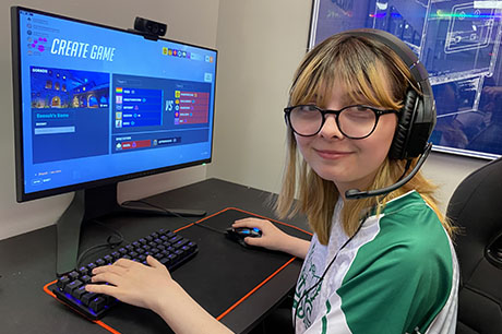 An Esports program student in NMC's Esports lab
