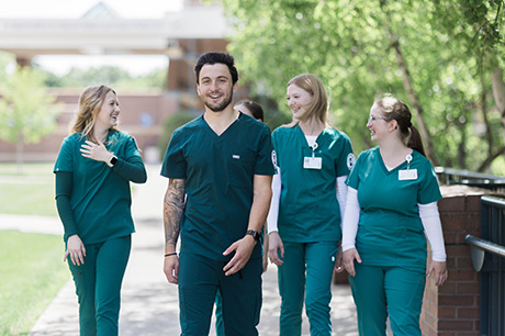 Nursing program students outside partner hospital Munson Medical Center