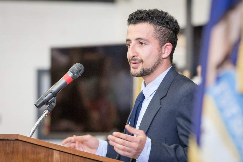 NMC student Edris Fana speaks at the 2016 NMC Commencement