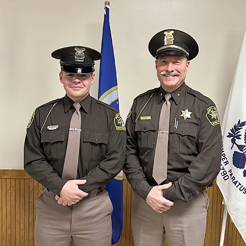 NMC Police Academy Graduate Andrew Bankey and Grand Traverse County Sheriff Mike Shea