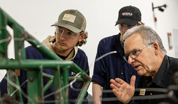 Automotive Program Coordinator Wayne Moody and students