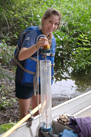 Chelsea Cooper of NMC's Great Lakes Water Studies Institute tests water quality on a local lake