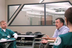 Nursing instructor Mac Beeker and students