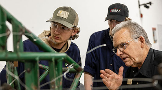 Automotive Program Coordinator Wayne Moody and students