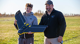 UAS program instructor Carl Rocheleau works with a student at NMC's UAS training property in Yuba.