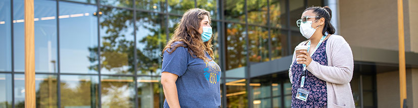 Photo of students on campus with face masks