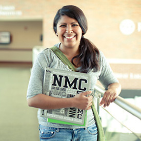 International student with an NMC notebook