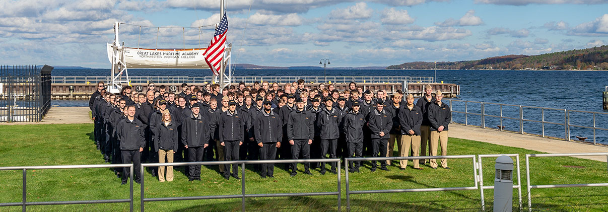 Great Lakes Maritime Academy cadets and staff at a Mariners Memorial service on the harbor side of the Academy