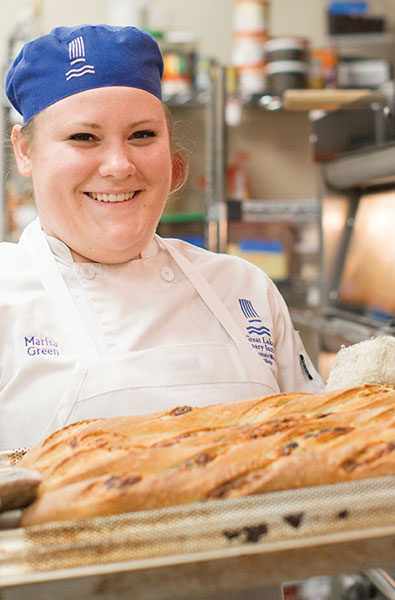 Culinary student with baked goods