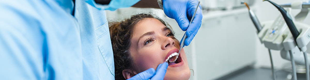 A Dental Assistant works on a patient