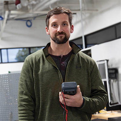 NMC Engineering Technology Program student and veteran John Monaghan in a lab