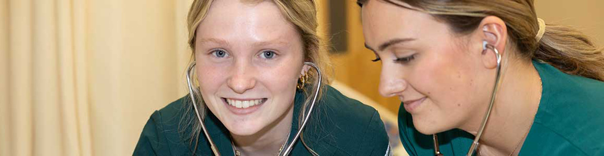 NMC nursing program students with stethoscopes