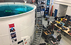 Photo of the 60,000-gallon indoor research and training tank located at NMC's Aero Park campus, which is used for ROV training by marine technology program students