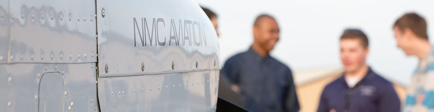 NMC Aviation program students with a Cessna Skyhawk used for flight instruction