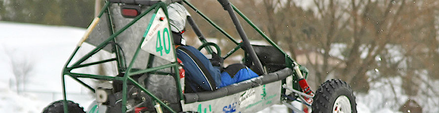 NMC engineering program student races the college's entry in the annual Baja car race
