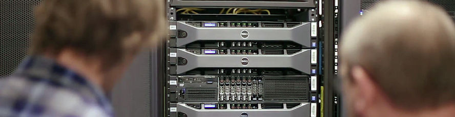 CIT infrastructure specialist program student and instructor inspecting a a computer rack and network