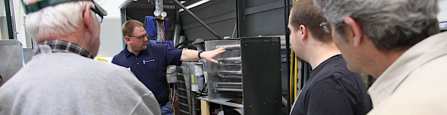 An NMC Construction Technology Facilities Maintenance Program instructor and students
