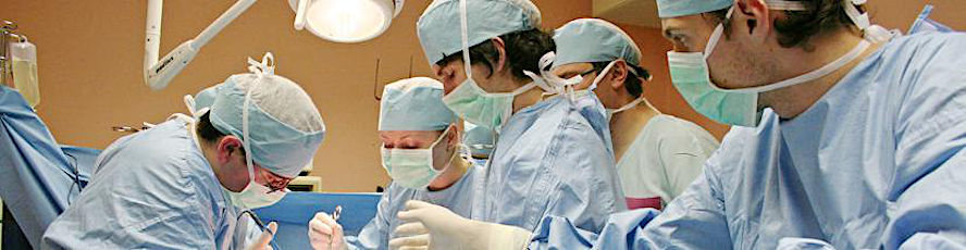 NMC Surgical Technology program students watch a doctor perform a surgical procedure