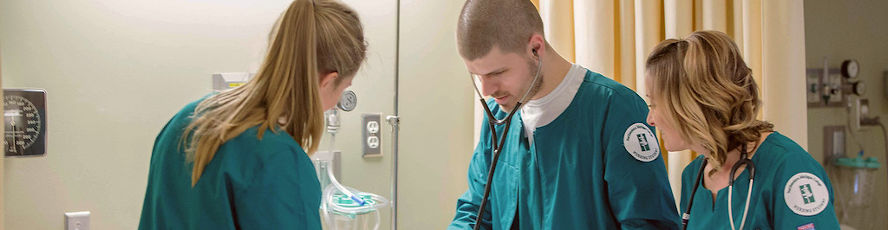 NMC Nursing program students examine a patient