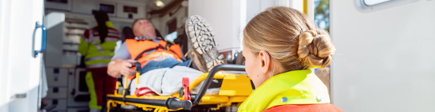 Paramedics and a patient in an ambulance