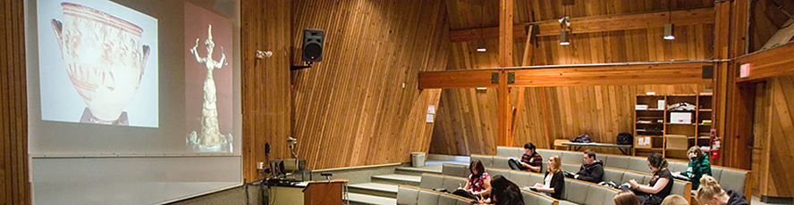 NMC Arts / Fine Arts program students watch an art history presentation in the Fine Arts building