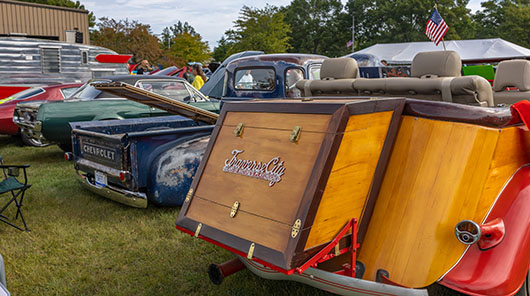 A custom wood-bodied "boattail" speedster at the 2026 Mike McIntosh Truck & Car Show