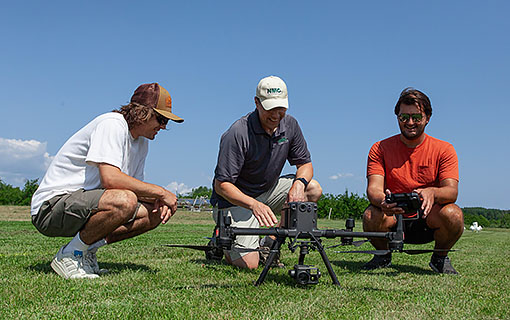 UAS Program Coordinator Tony Sauerbrey demonstrates a DJI Matrice 300 RTK drone to students during a Commercial Drone Operations course in the summer of 2023.