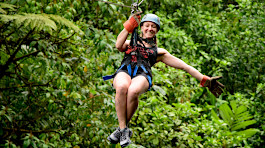 Costa Rica study group student on a zip line