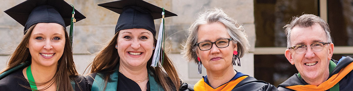 NMC students and instructors at a graduation celebration